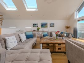 A living room with a sofa and coffee table at 2 Remera St Ives
