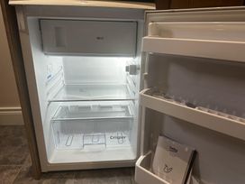 A refrigerator with a crisper drawer and ice tray at The Rocks in Newry