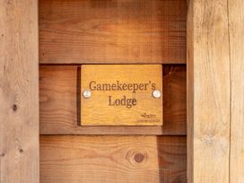A nameplate reading Gamekeeper's Lodge at Valley View Lodge 1 Preston