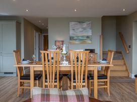 A dining room with a table and chairs at Valley View Lodge 1 Preston