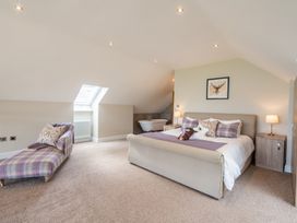 A bedroom with a bed and a bath tub at Valley View Lodge 1 in Preston