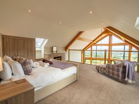 A bedroom with a bed and furniture at Valley View Lodge 1 Preston