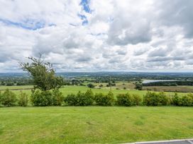 A landscape view with trees and fields at Valley View Lodge 1 in Preston