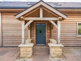 An entrance with a porch and front door at Pendle View in Preston
