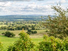 A landscape view with trees and fields at Pendle View in Preston
