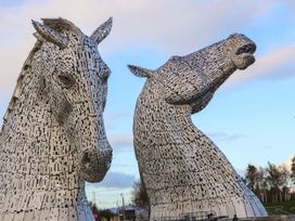 Two large horse sculptures made of metal at Beechtree Lodge 54 in Denny