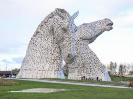 A sculpture of two horse heads at the Kelpies in Falkirk