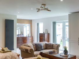 A living room with sofa and coffee table at 6 Front Street