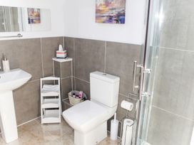 A bathroom with a sink and toilet at The Granary in Durham
