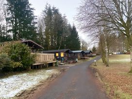A view of cabins along a road at Cabin 1 Moffat Manor in Moffat
