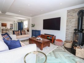 A living room with a sofa and a coffee table at Cootiya Corner in Great Lyth