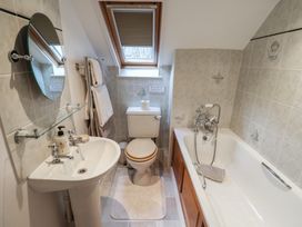 A bathroom with a sink and toilet at Ellishayes Farm in Combe Raleigh