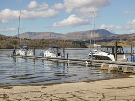 A marina with boats at a dock at 6 Waterside, White Cross Bay, Troutbeck Bridge