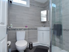 A bathroom featuring a toilet, sink, and shower at 226 Third Avenue in Bridlington
