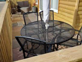 An outdoor area with a table and chairs at 226 Third Avenue in Bridlington
