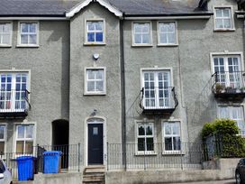 A building with balconies and fences at 17 Castleview in Ballymena