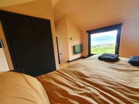 A bedroom with a view at Cullinview Isle of Skye