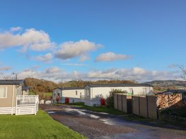 Static caravans along a road at WF32 - Jurassic Discovery in Charmouth