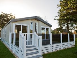 A house with steps and railing at Orchid 9 in Christchurch