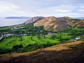 A scenic view of valleys and mountains at Sea view cottage in Penmaenmawr