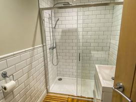 A bathroom with a shower and sink at Fox Lodge in York