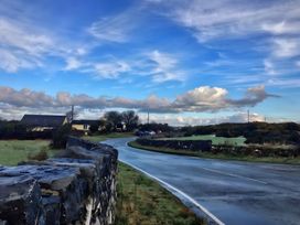 A view of the road with houses and clouds at Country Retreat Sleeps 2 in Holyhead