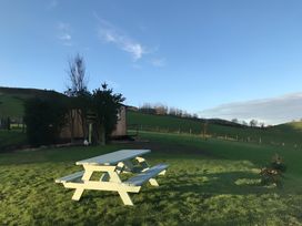 A picnic table on grass at Shepherds hut Dumfries