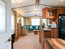 A living room with a sofa and coffee table at No 35 MP Billing Aquadrome Holiday Park