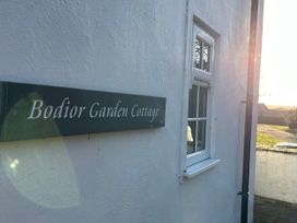 A sign for Bodior Garden Cottage at Bodior Garden Cottage Bach Rhoscolyn