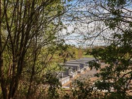 View of cabins surrounded by trees at No.6 - The Pines in Delamere
