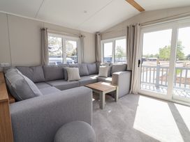 A living room with a sofa and coffee table at No.20 - The Oaks in Delamere
