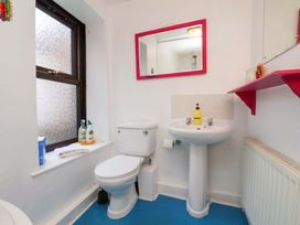 A bathroom with a sink and toilet at Frida's Cottage in Whitby