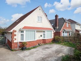 A house with windows and garden at 15 Coombe Avenue