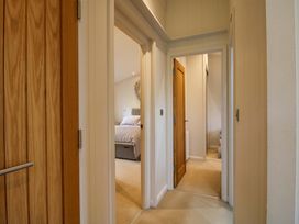 A hallway with multiple doors at 5 Hillview Lodges Cleobury Mortimer