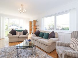 A living room with sofas and a coffee table at Wansfell View in Ambleside