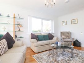 A living room with a sofa and coffee table at Wansfell View in Ambleside