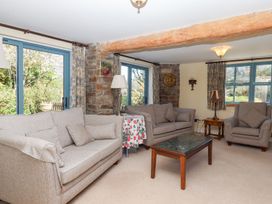 A living room with sofas and a coffee table at Pillars in Barnstaple