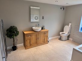 A bathroom with a sink and a toilet at 15 Lamsey Lane King's Lynn