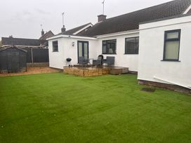 A house with seating area on the patio at 15 Lamsey Lane King's Lynn