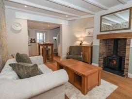A living room with a sofa and coffee table at No.4 Main Street in Hull