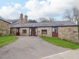 A house with a driveway and grass at Little Tregarrick in Helston