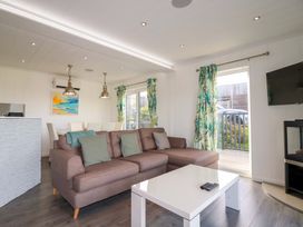 A living room with a sofa and a coffee table at 114 - The Residance in Redruth