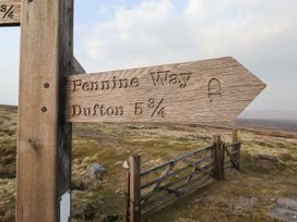 A signpost indicating the direction for Pennine Way and Dufton at Dunfell Shepherd's Hut in Appleby-In-Westmorland