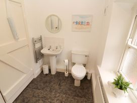 A bathroom with a sink and toilet at Easthwaite Cottage in Holmrook near Easthwaite Farm
