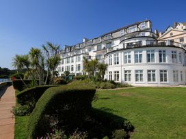 A building with balconies and gardens at 3 The Salcombe in Salcombe