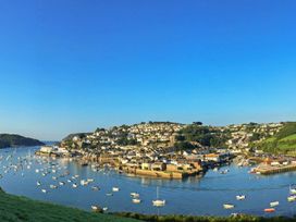 A view of a harbor with boats and houses at 3 The Salcombe, Salcombe