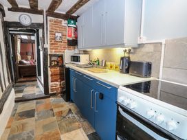A kitchen with various appliances at Driftway Stables Retreat in Diss