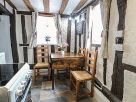 A kitchen with a table and chairs at Driftway Stables Retreat in Diss