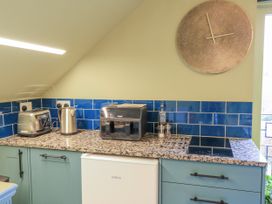 A kitchen with appliances on the counter at Golden Valley View in Stroud