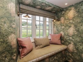 A nook with a window and seating at Low House Cottage Ayside near Newby Bridge